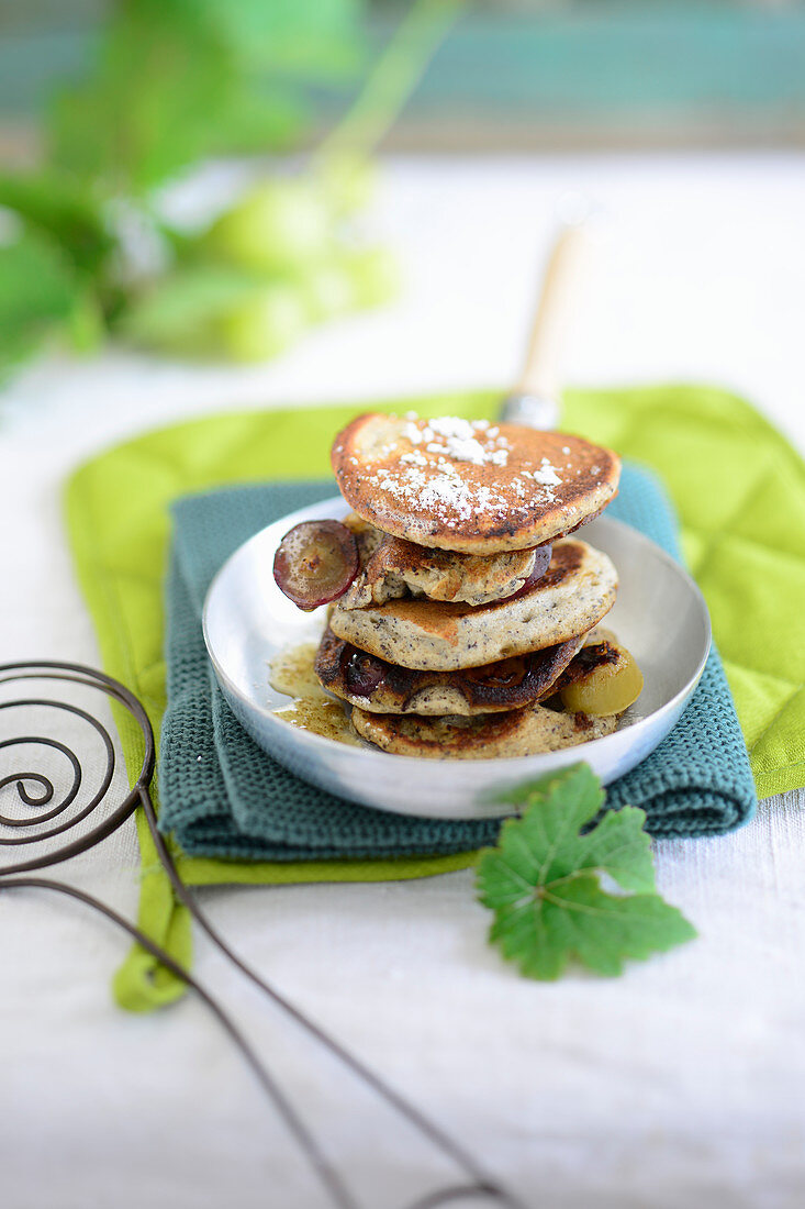 Poppyseed pancakes with grapes