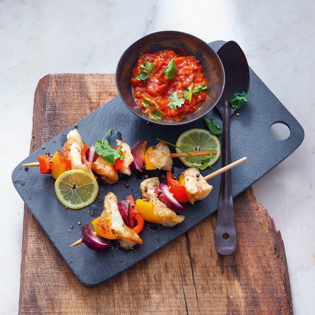 Grilled fish and vegetable kebabs with salsa
