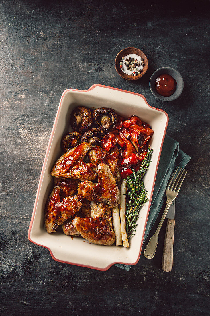 Barbecue chicken wings with grilled vegetables