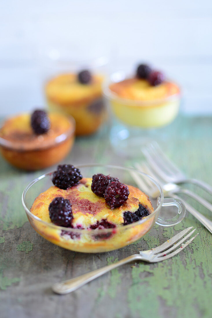 Blackberry and cheese cakes in a glass cup
