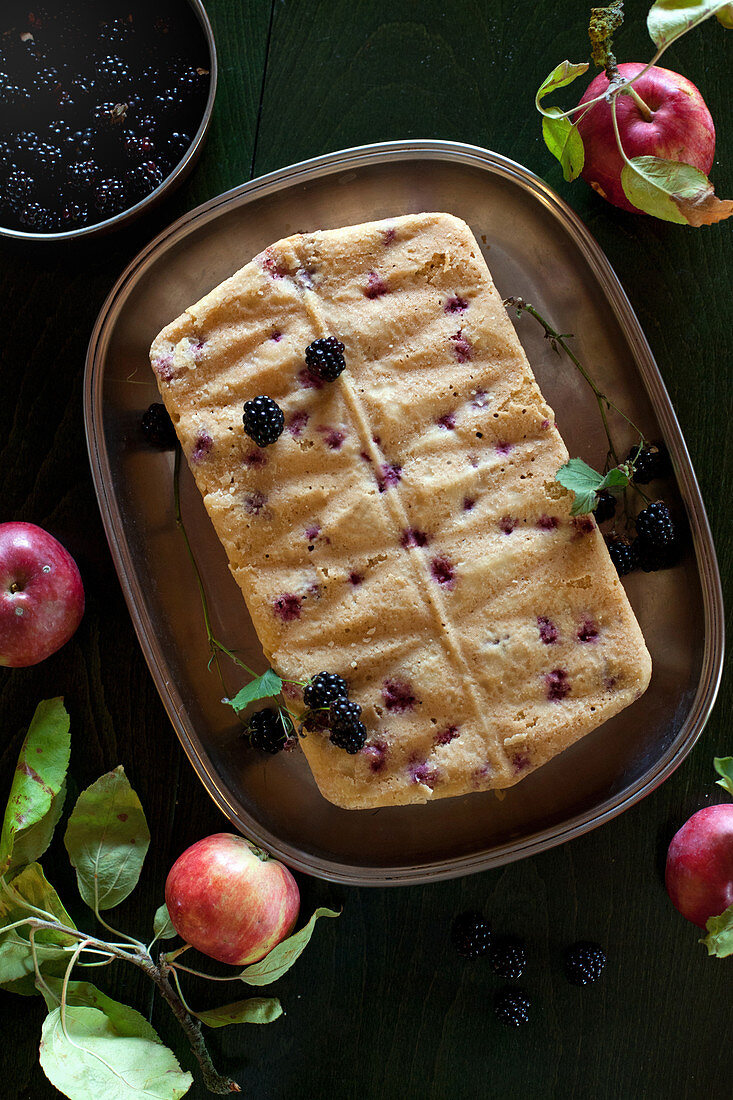 Cake with blackberries and apples