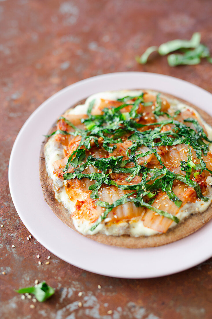 Low-carb tarte flambée with kimchi and water spinach