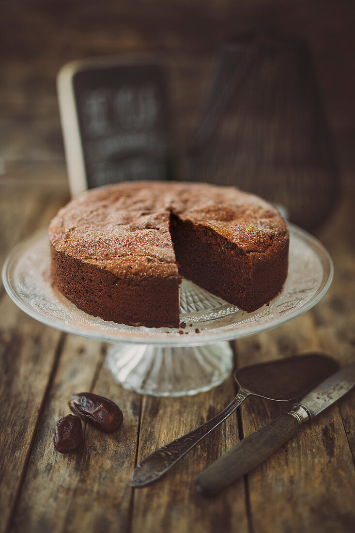 Gluten-free, lactose-free, low-fat, sugar-free chocolate cake on a cake stand