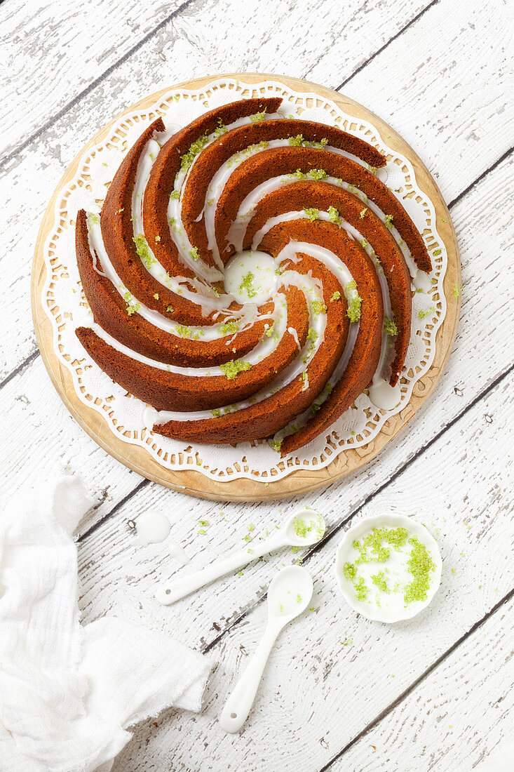 Overhead Courgette Lime Bundt Cake with Drizzled Icing Lime Zest