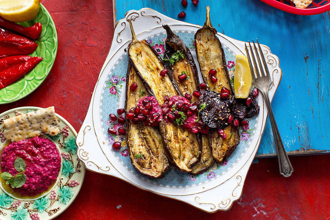 Roasted aubergines with a beetroot hummus, pomegranate and spearmint