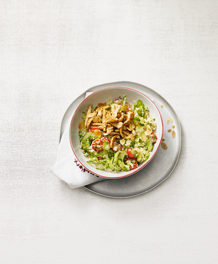 Tabbouleh made from cauliflower with cucumber and chicken breast (no carb)