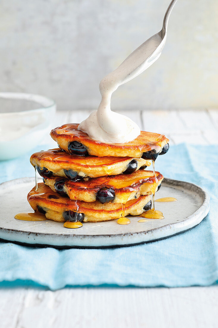 Pancakes with berries and vanilla cream