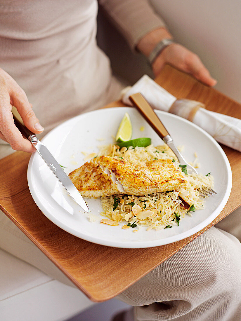 Pan-fried fish with almond rice pilaf