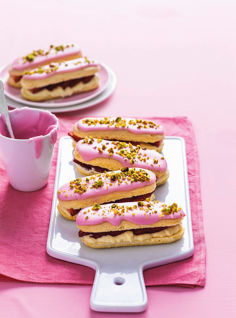 Strawberry and pistachio eclairs