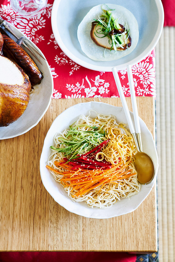 Christmas noodles with carrots and cucumber