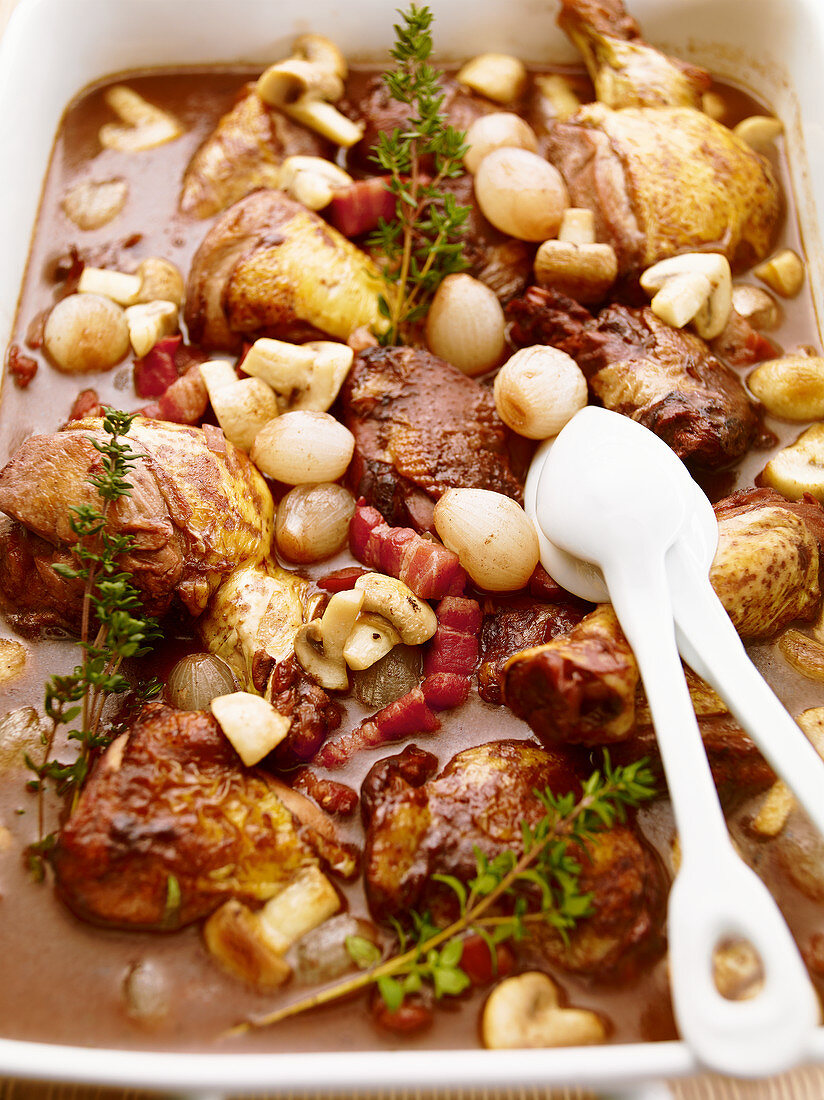Coq au vin with bacon and mushrooms