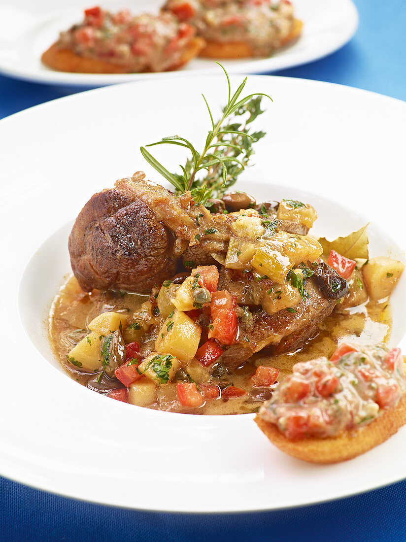 Light ossobuco with capers and crostini