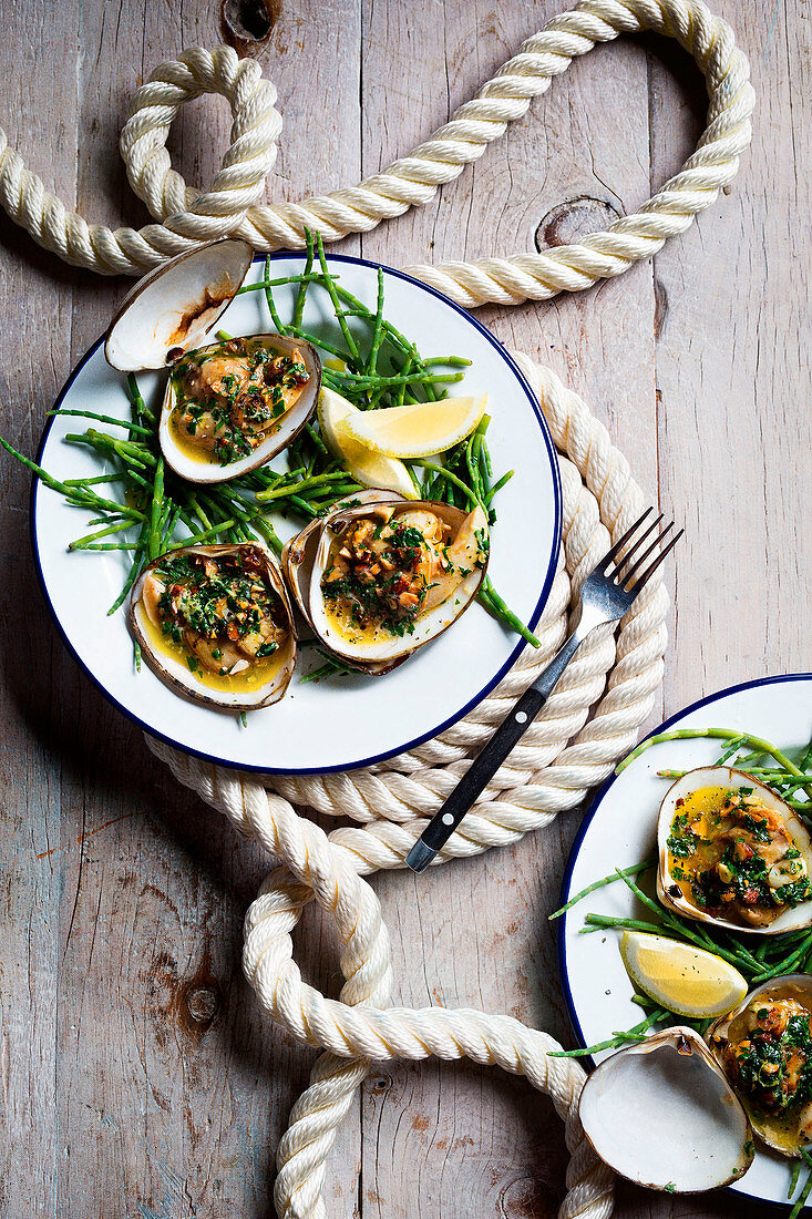 Barbecued clams with almond and parsley butter