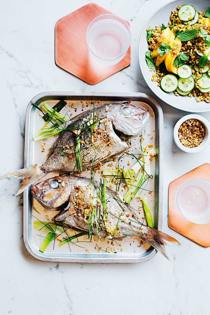 Baked snapper with chickpea salt and freekeh salad