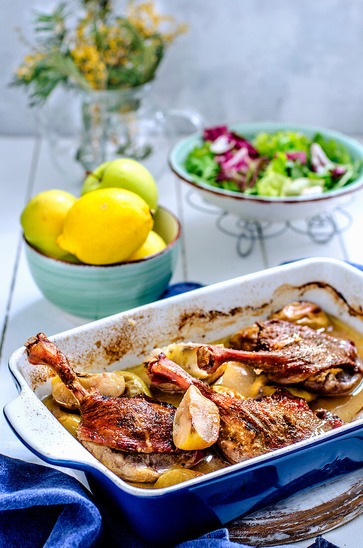 Duck legs with apples
