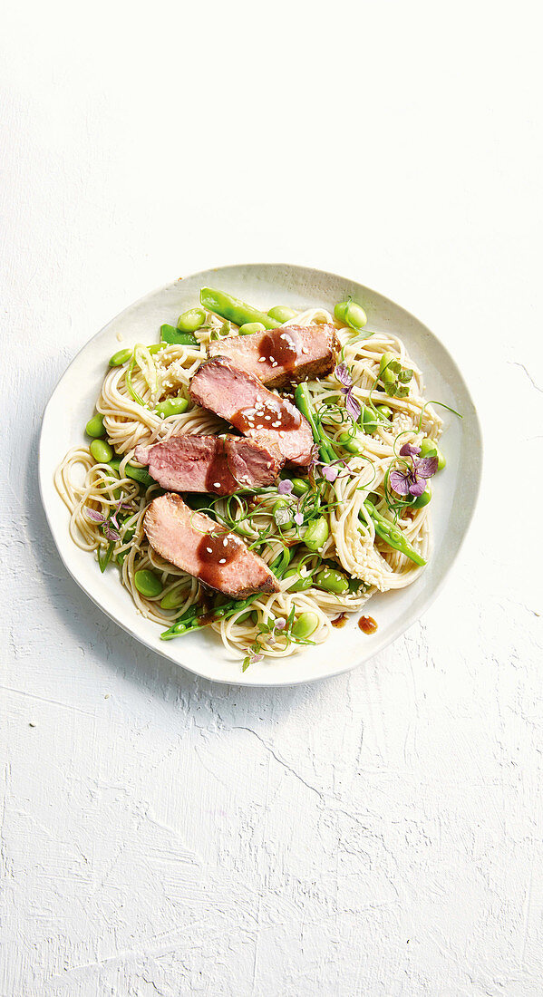 Plum and ginger glazed lamb with soba noodle salad