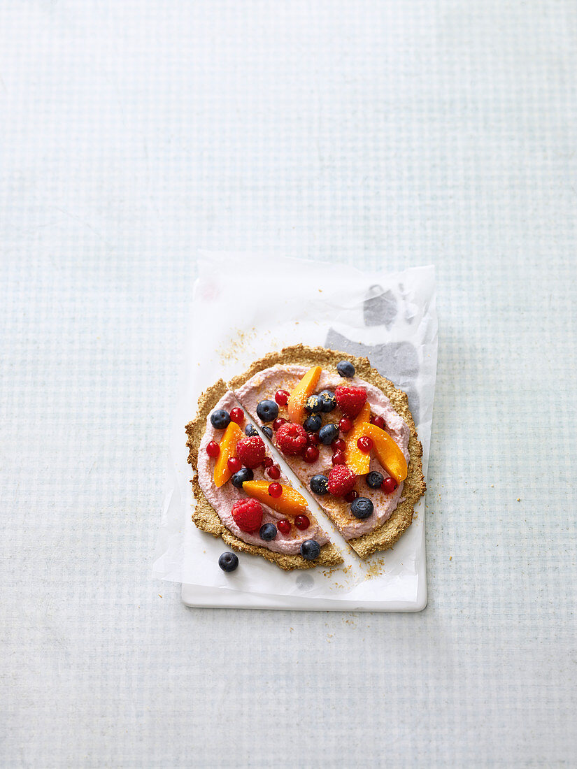 A breakfast pizza with raspberry quark