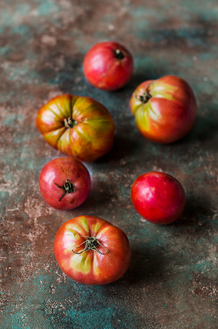 Several heirloom tomatoes