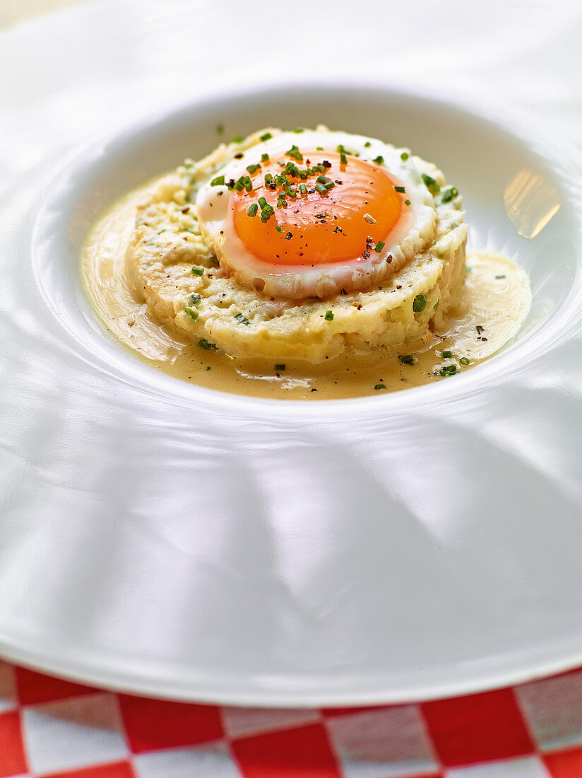 Smoked parsnip mash with a fried egg and mustard butter sauce