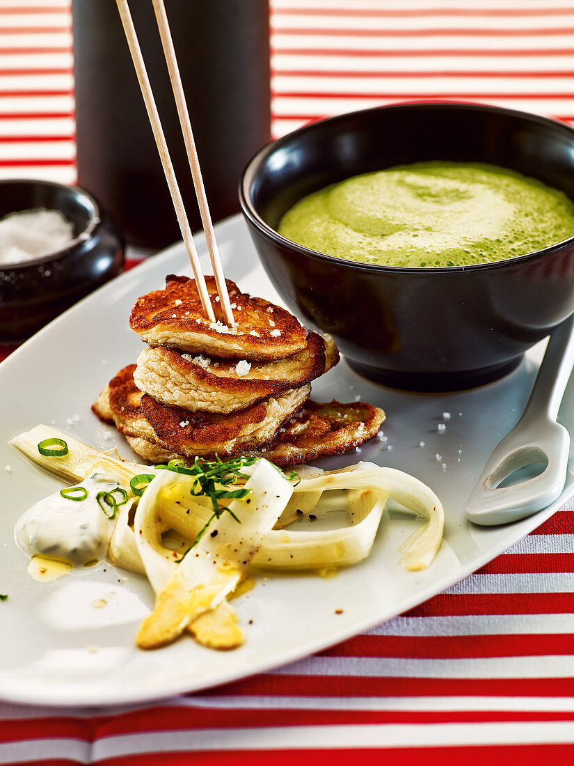 Blinis with marinated asparagus and herb foam soup