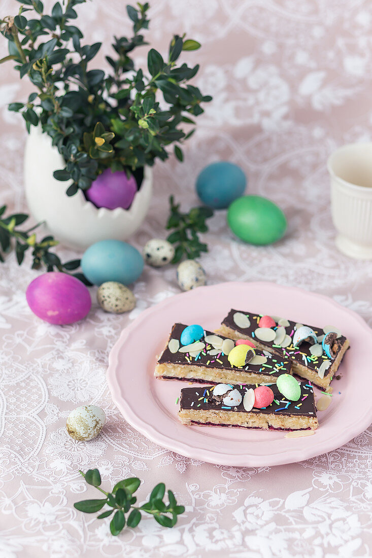 Slices of no bake Polish Easter cake (mazurek), with marzipan filling and chocolate