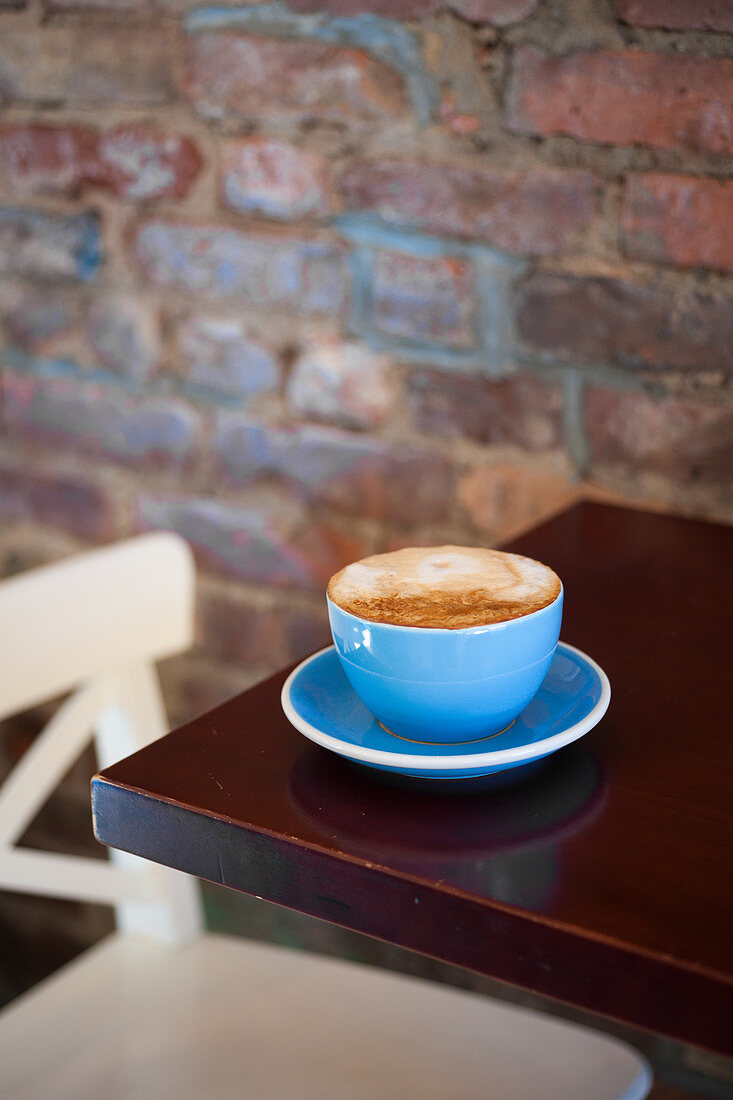 A caffe latte on a restaurant table