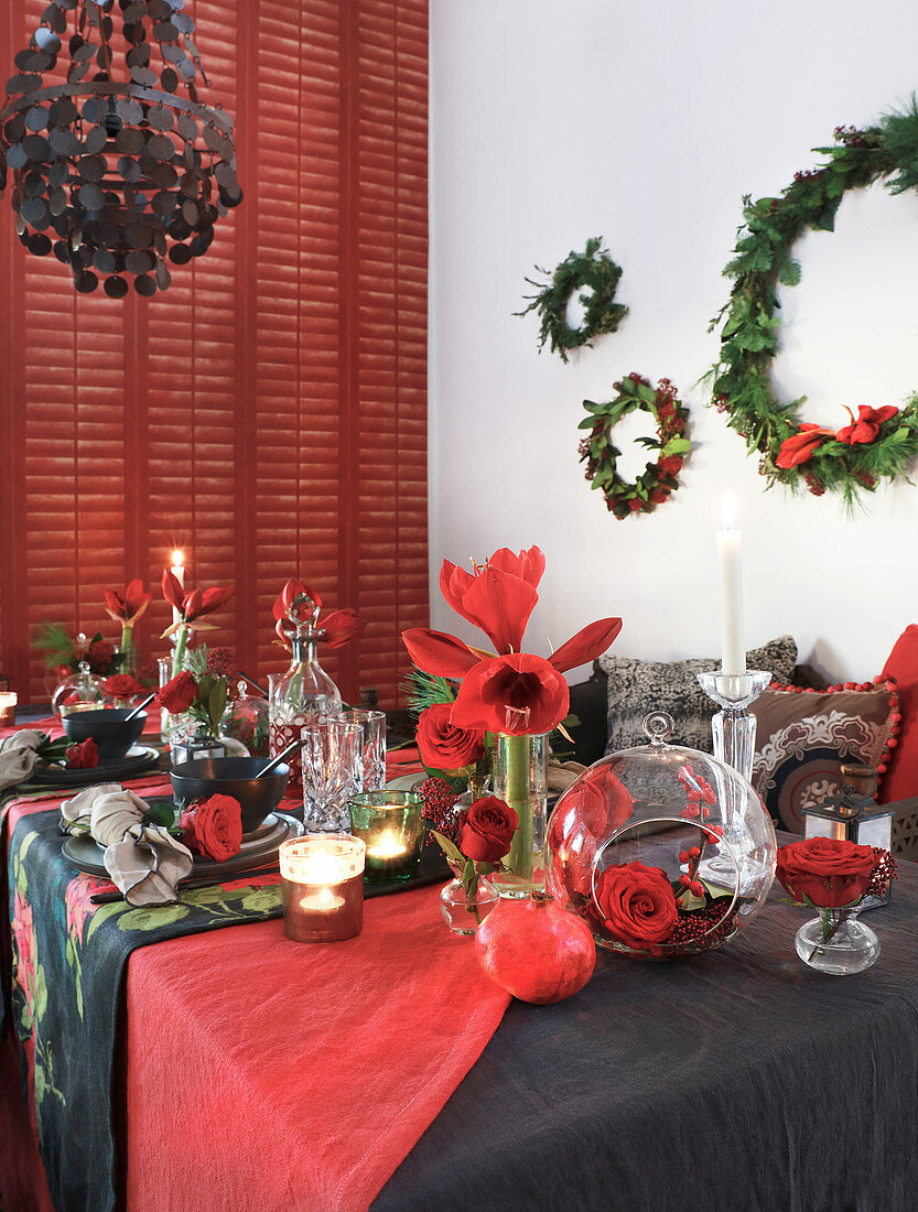 Table festively set for Christmas in red and black