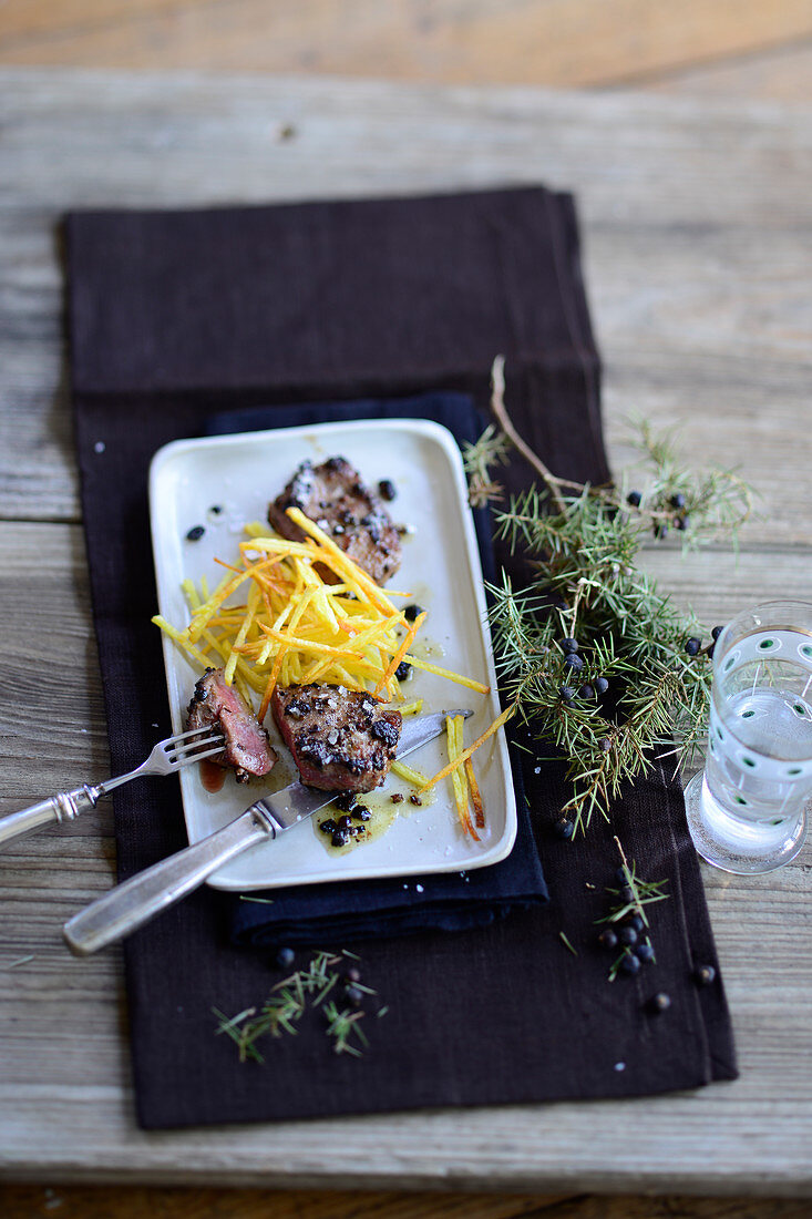 Juniper berry saddle of lamb with potato straw