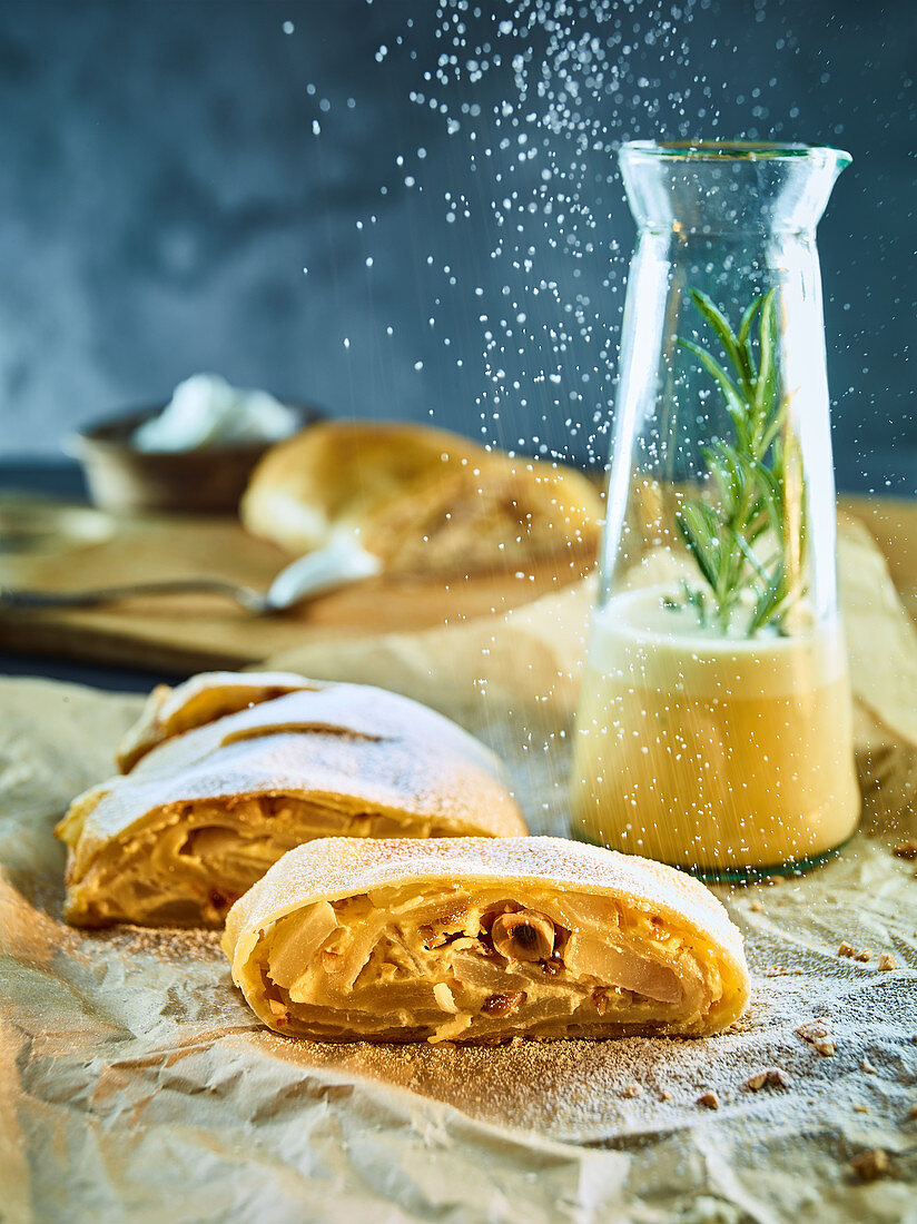 Pear strudel with rosemary sauce and tipsy cream