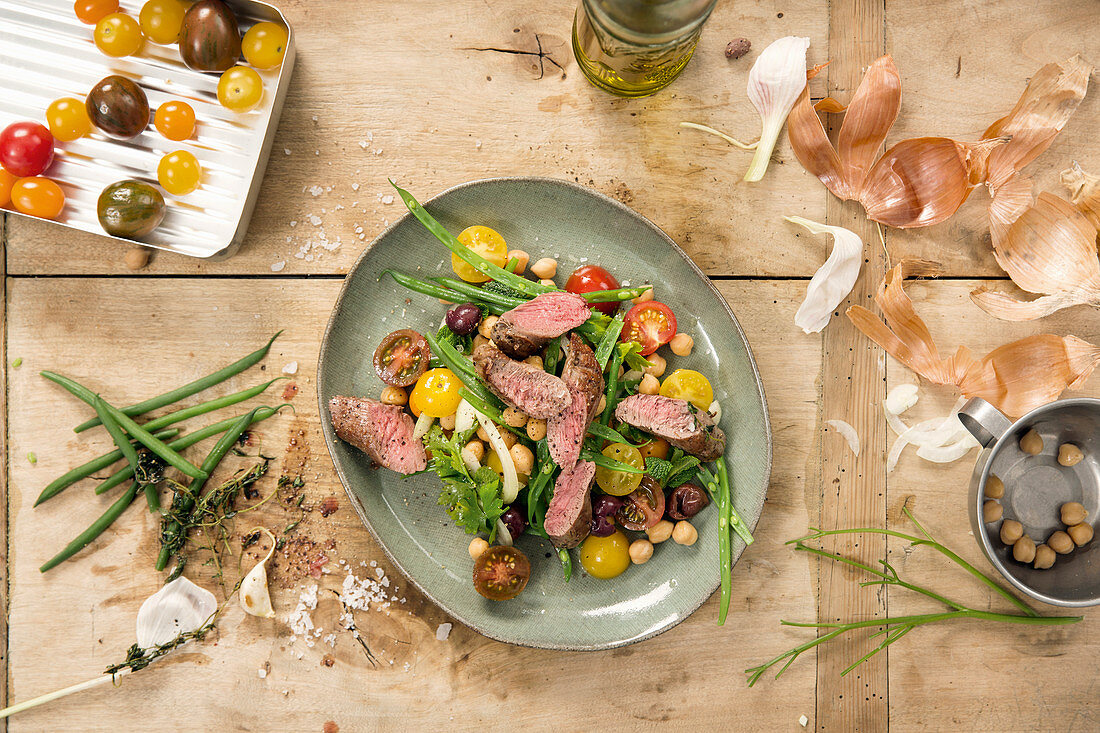 Greek salad with lamb fillet and chickpeas