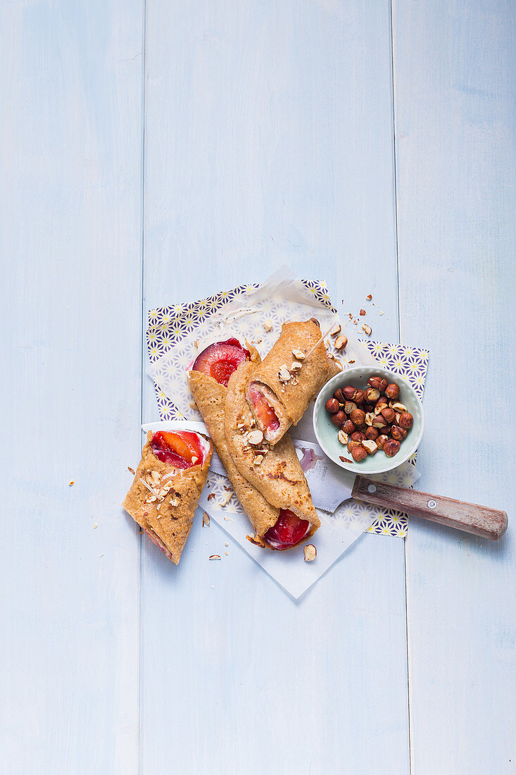 Plum crepes with hazelnuts