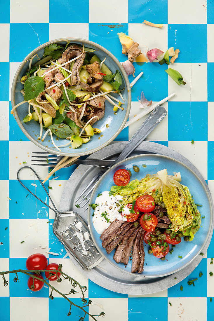 Beef fillet with a Caesar dressing, and Thai-style beef salad
