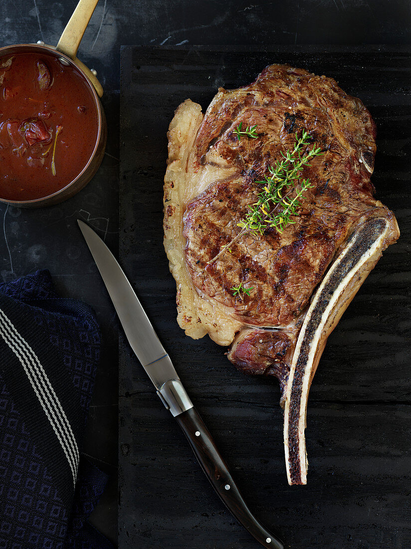 Beef steak with thyme and mushroom sauce