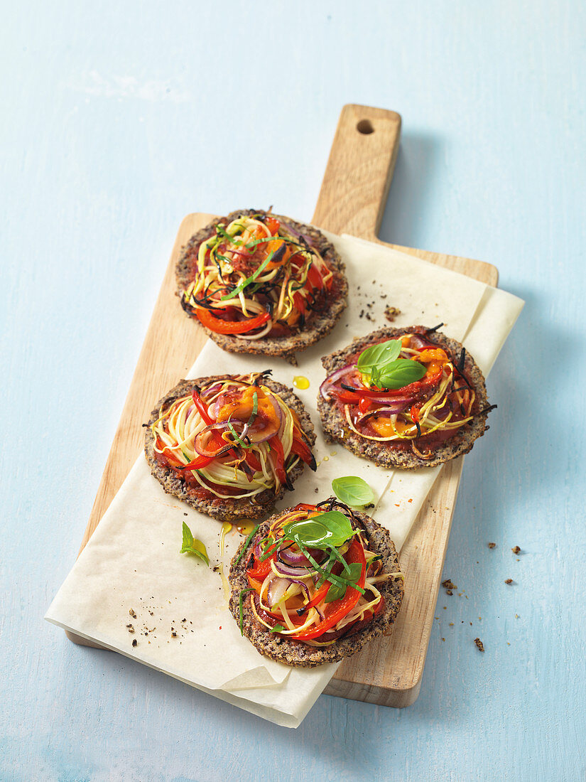 Low card mini pizzas with colourful vegetable spirals