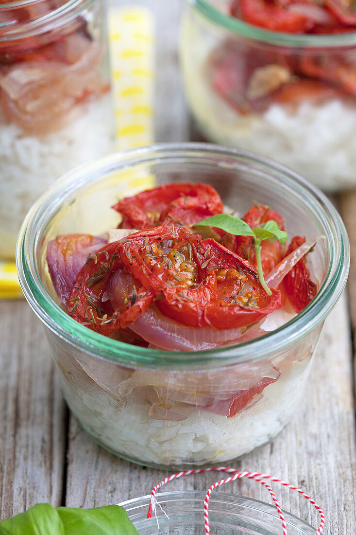 Baked tomatoes with basil on rice