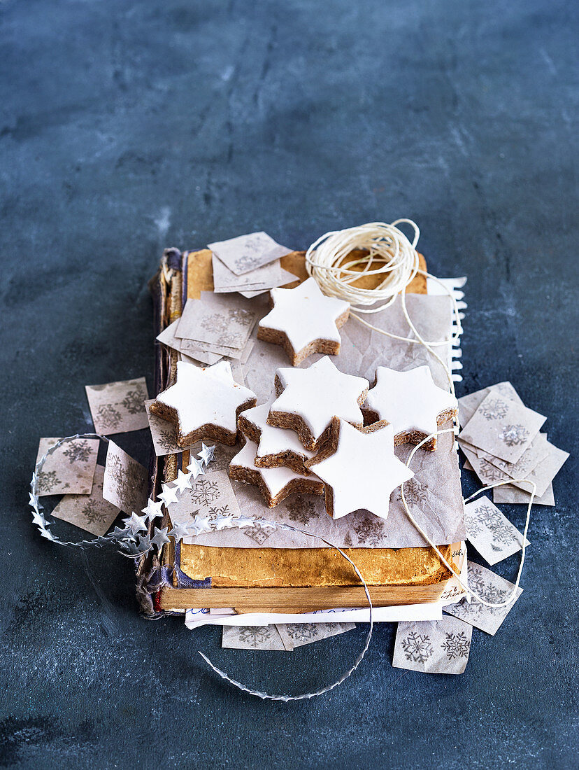 Cinnamon stars on an old book