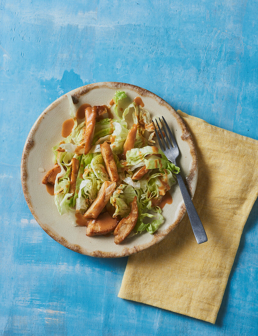 Peanut chicken on iceberg lettuce with a coconut dressing