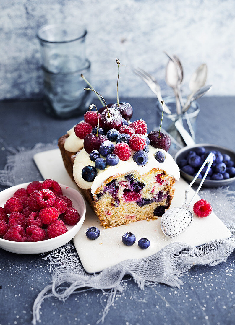 Berry cake with quark cream served with fresh berries