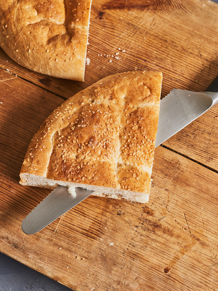 Unleavened bread being sliced