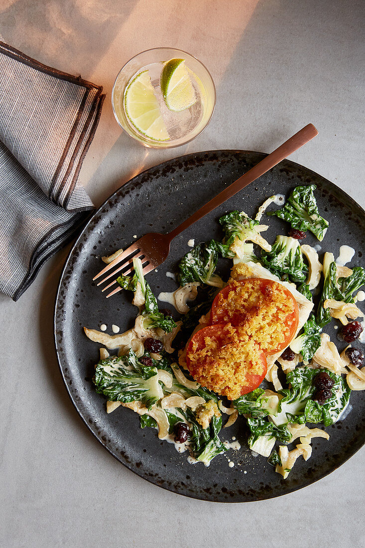 Fish fillet with a breadcrumb crust on a bed of broccoli