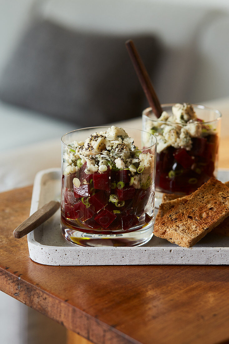 Beetroot salad with blue cheese in glasses