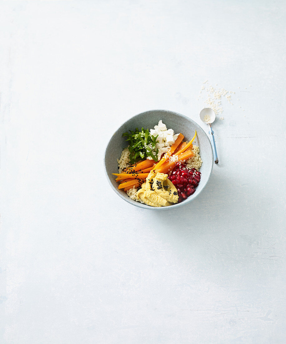 Couscous bowl with glazed carrots