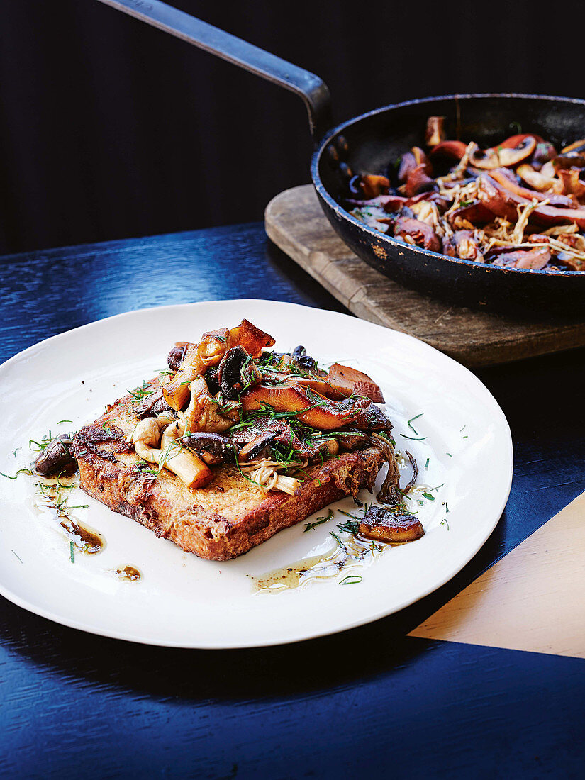 French toast with mixed mushrooms in a frying pan