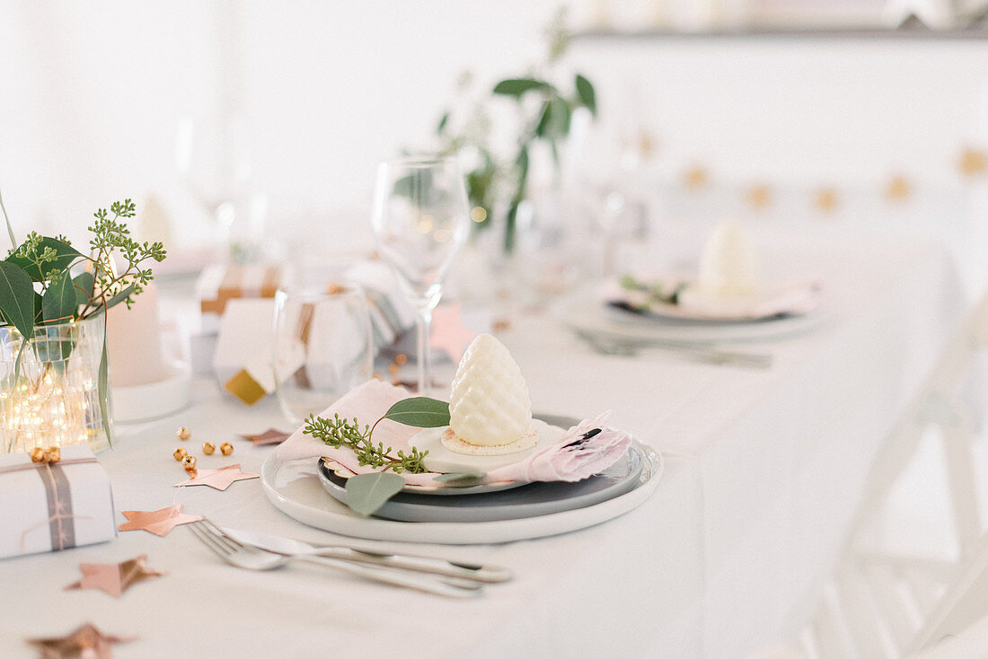 Modern place settings on Christmas table