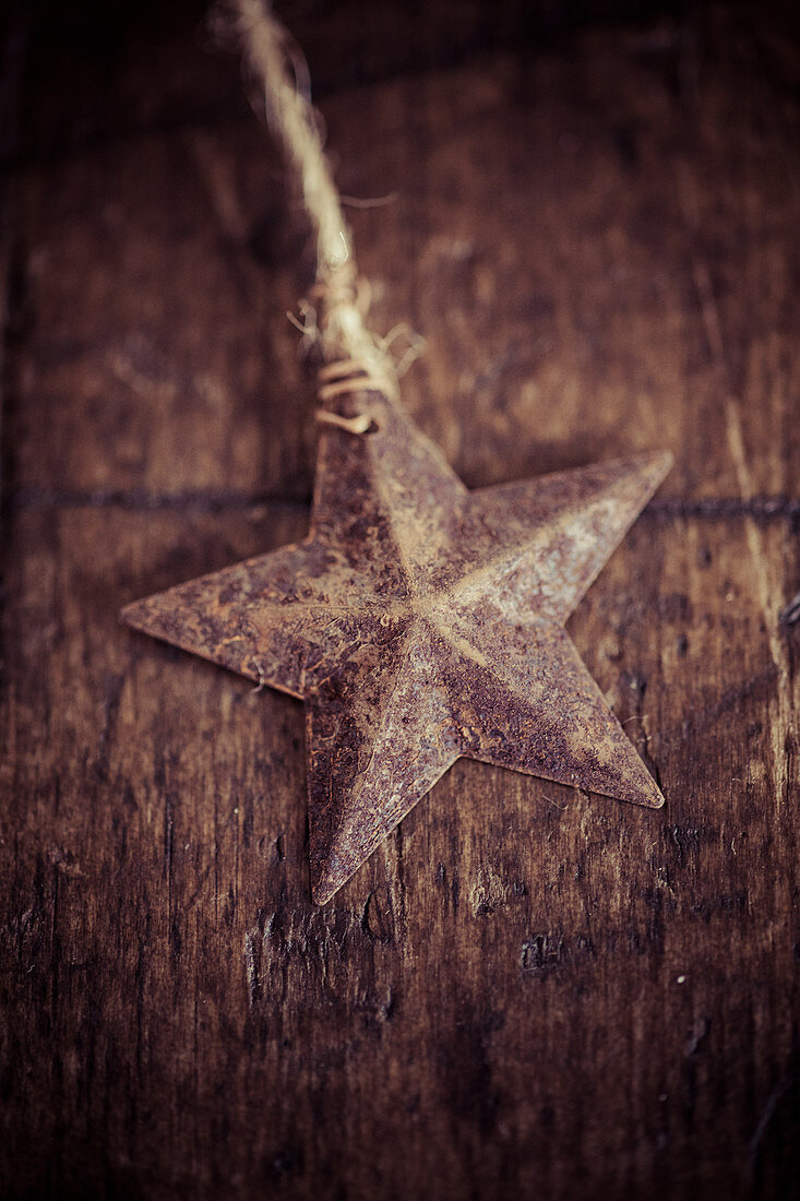Vintage star decoration on wooden surface