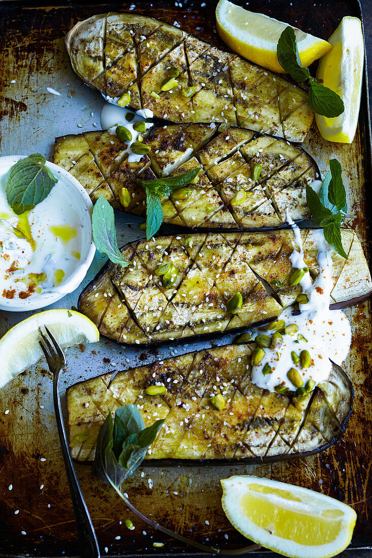 Grilled aubergines with yoghurt, mint and pistachios