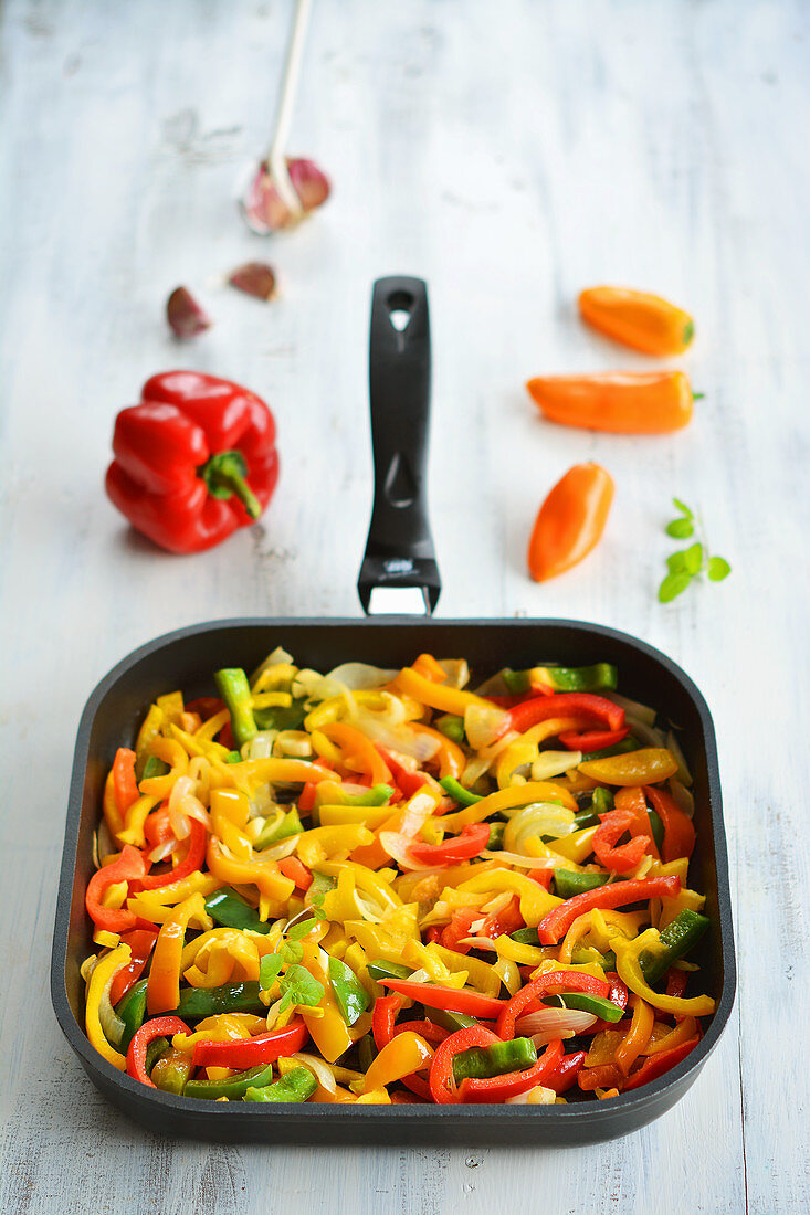 Colourful peppers in a pan