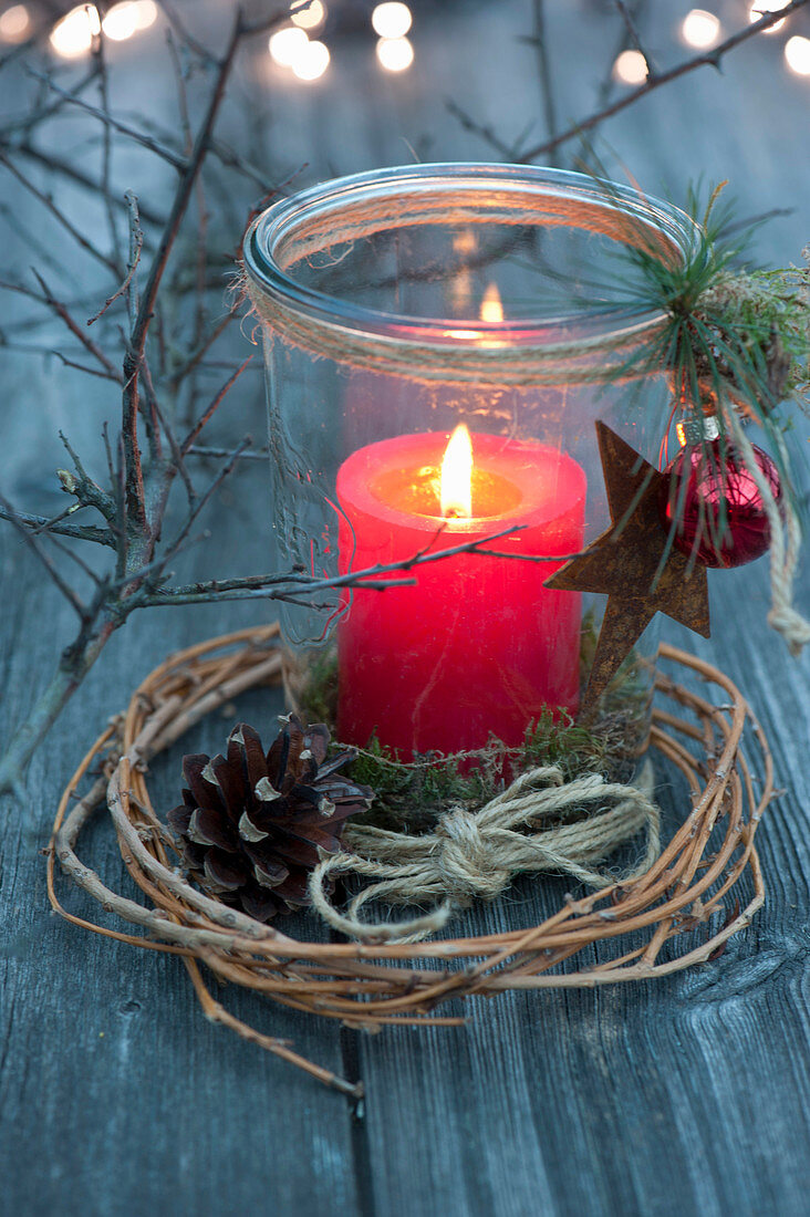 Mason jar as a lantern with red candle