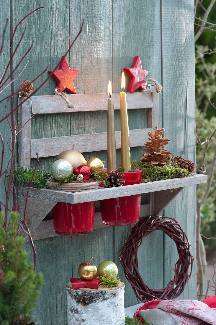 Christmas arrangement in wall bracket