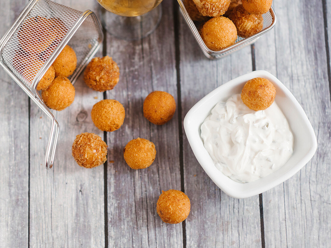 Fried cheese balls with a yoghurt dip